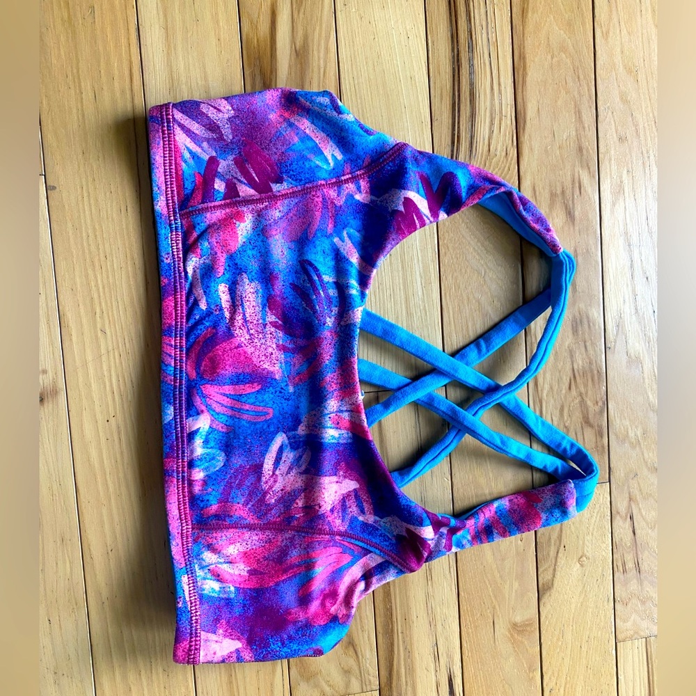 A colorful sports bra. The brand is ivivva, it’s a 14, more like a teens bra.